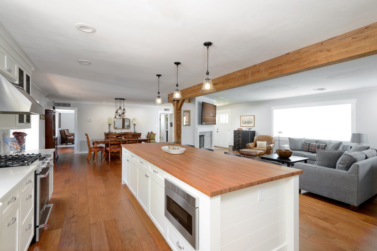 Kitchen with an island and wooden countertops