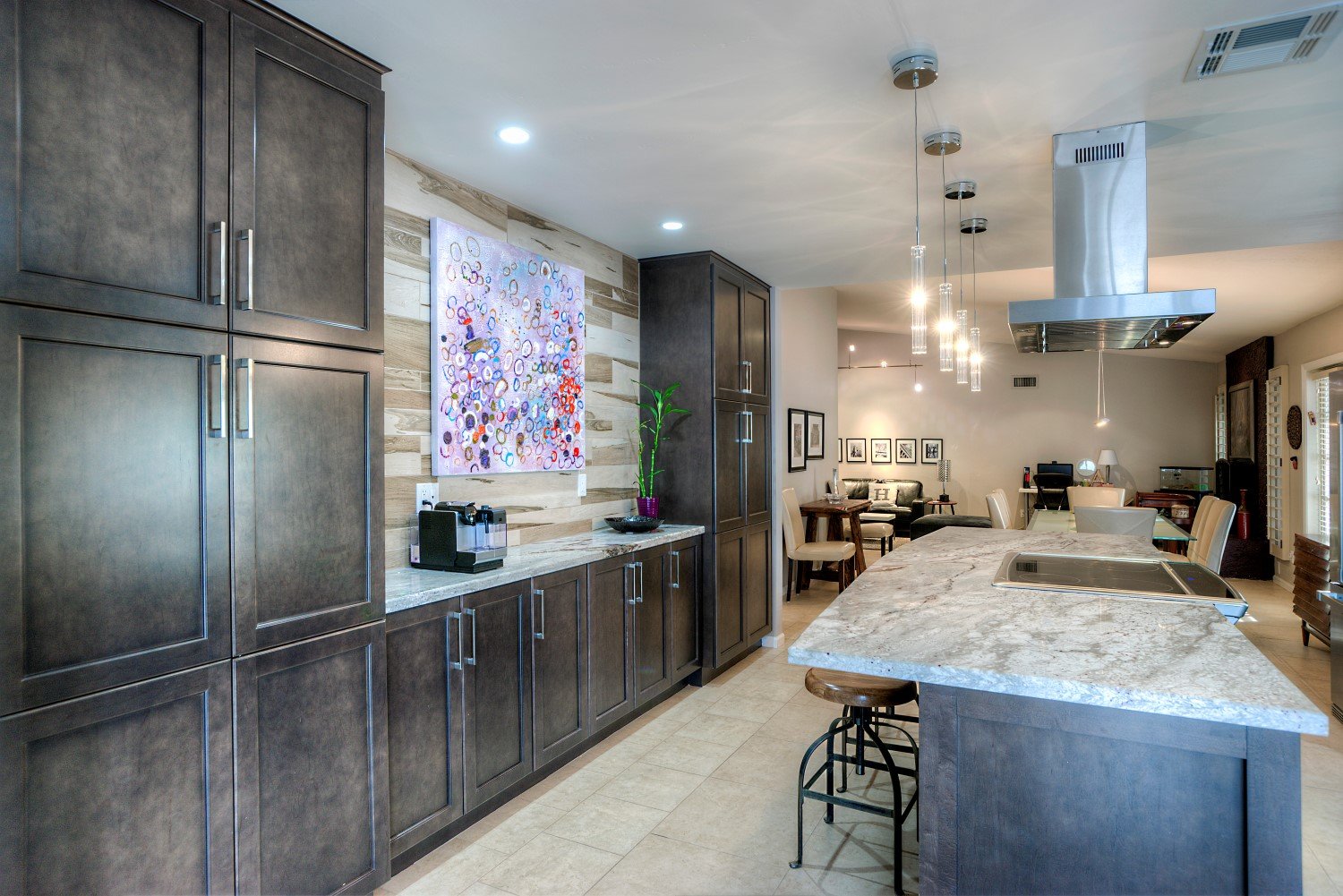 Wooden storage spaces with a granite kitchen countertop