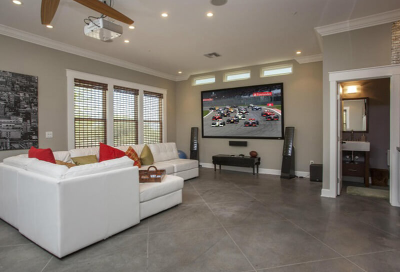 Family Room TV with a White Sectional Couch