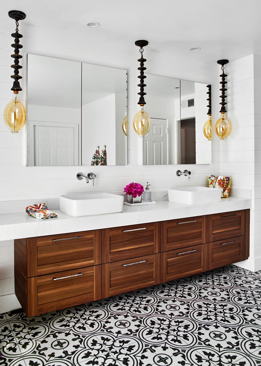 Contemporary bathroom double vanity with pop of color from flowers