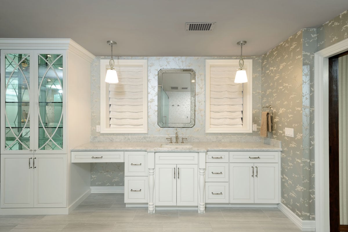 Make up station and white bathroom cabinetry master bathroom