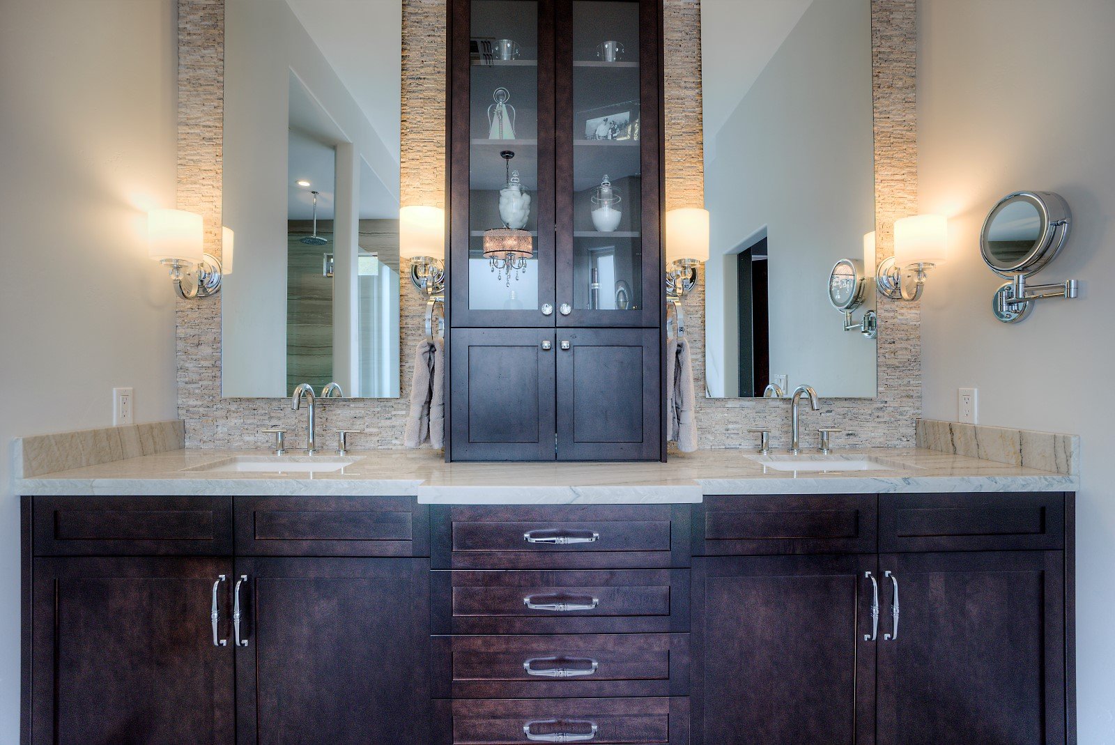 Bathroom with dark wood cabinets and double vanity