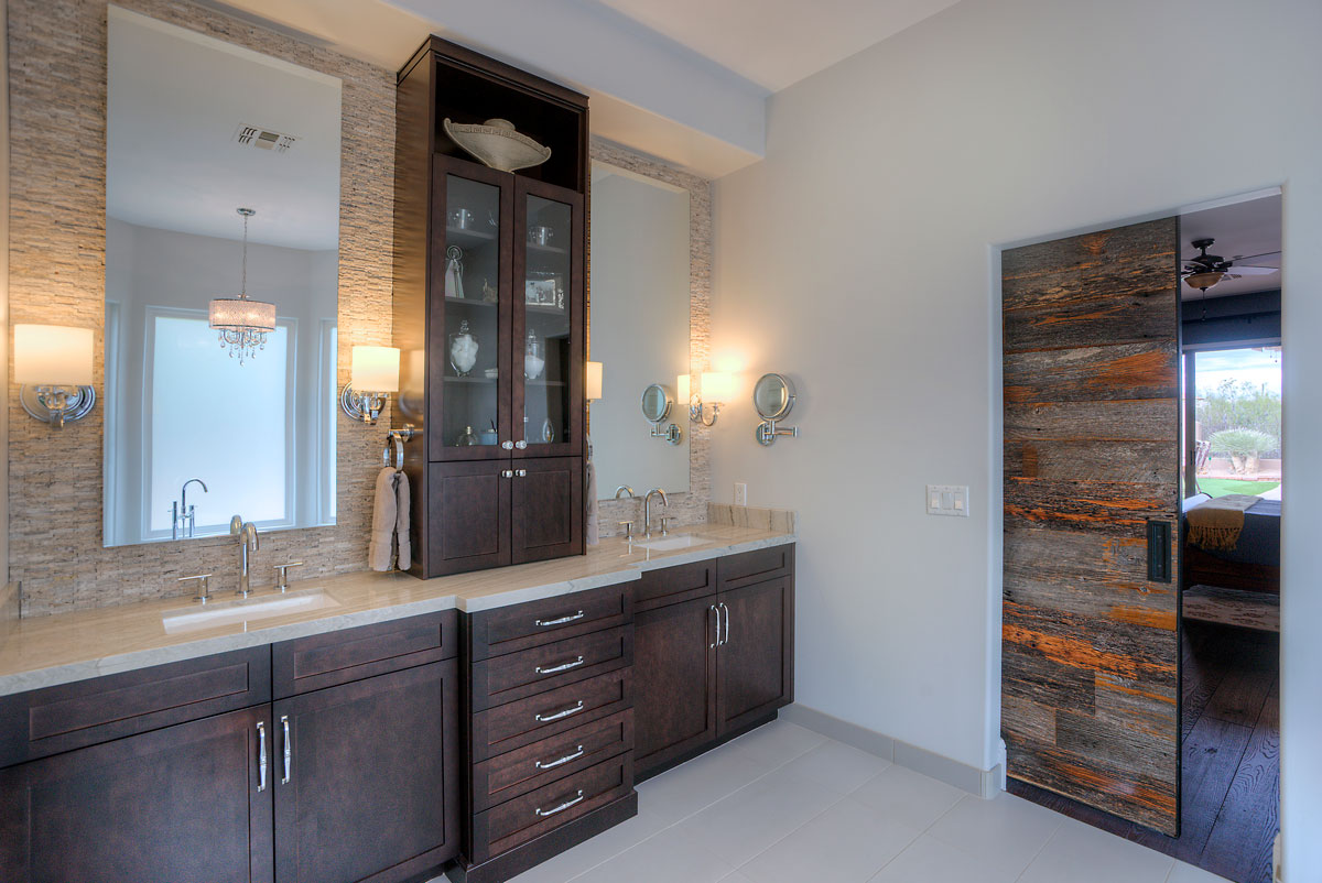 Southwestern bathroom with beautiful wooden double vanity
